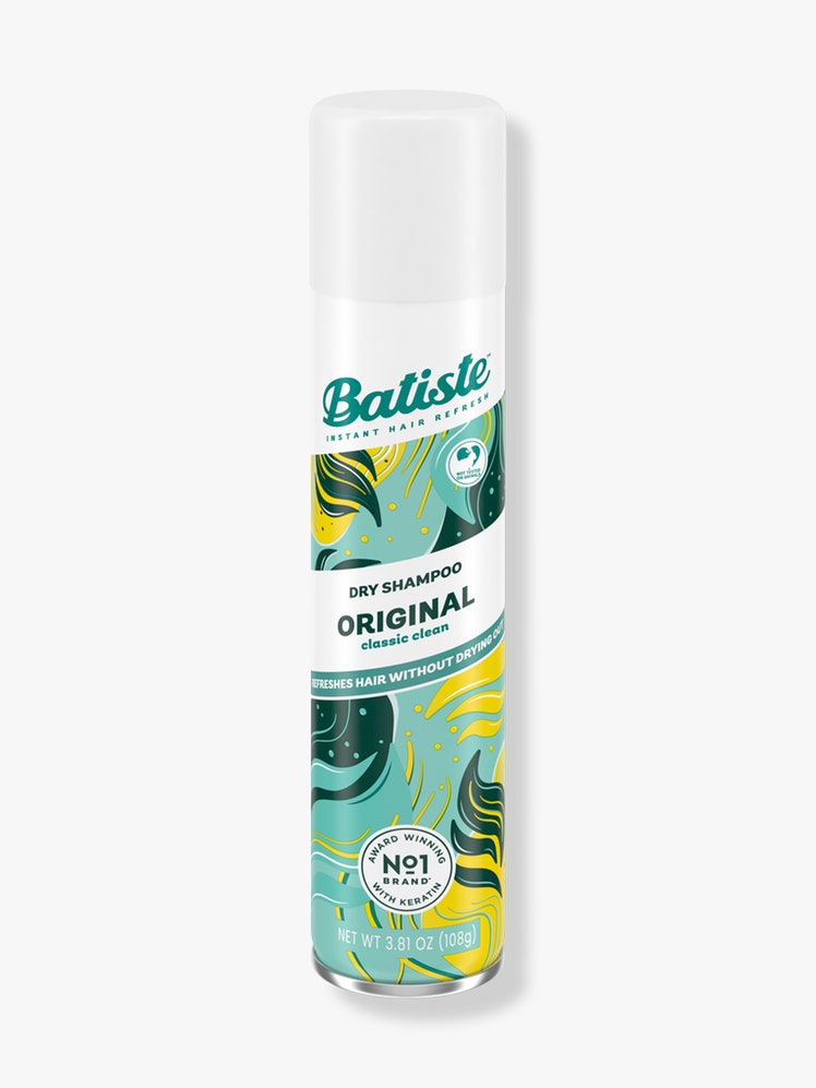 Batiste Original Dry Shampoo blue and yellow tropical print spray canister on light gray background