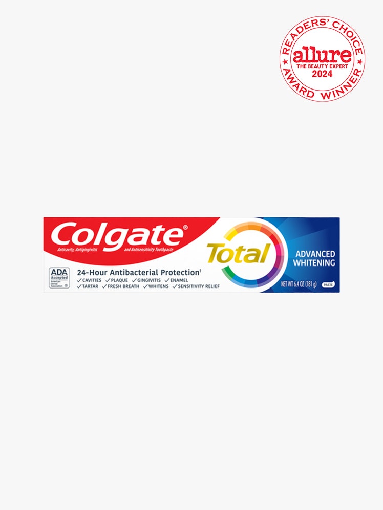 Colgate Total Advanced Whitening Toothpaste red, white and blue box of toothpaste on light gray background with white and red Allure Readers' Choice Award seal in the top right corner