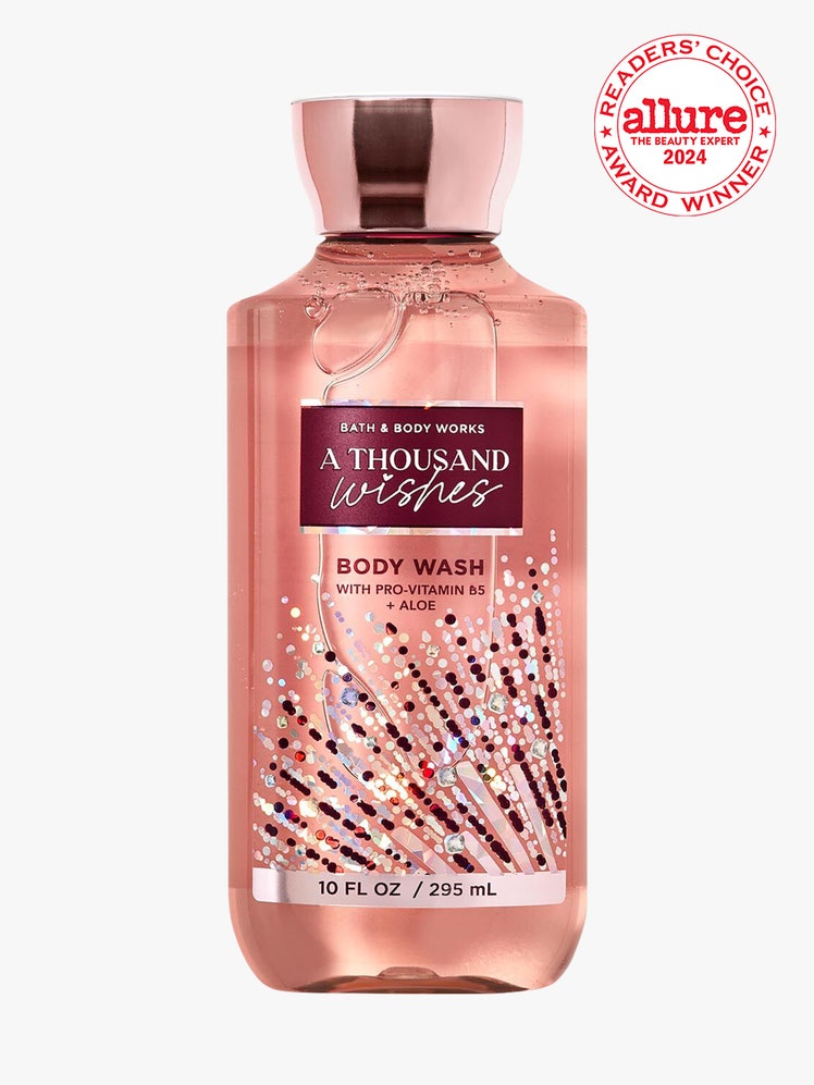 Bath  Body Works A Thousand Wishes Body Wash pink bottle of body wash on light gray background with white and red Allure...