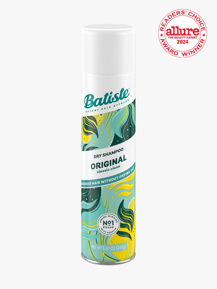 Batiste Dry Shampoo Original blue green and yellow leaf print spray canister of dry shampoo with white cap on light gray...