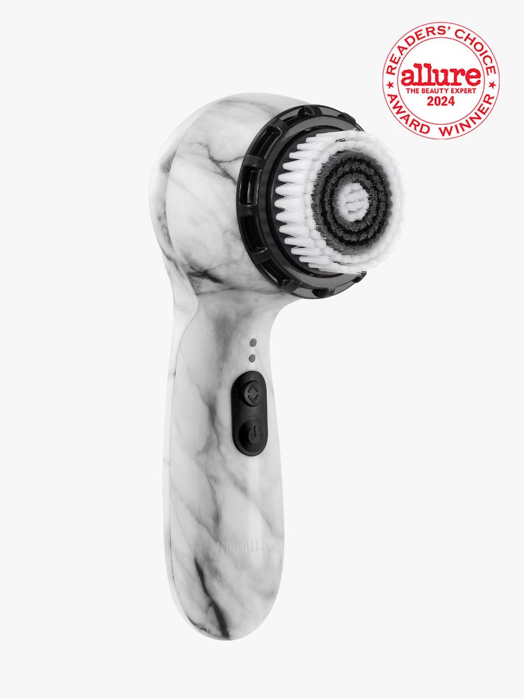 Michael Todd Beauty Soniclear Petite Sonic Cleansing System black and white marble facial cleansing brush on light gray...