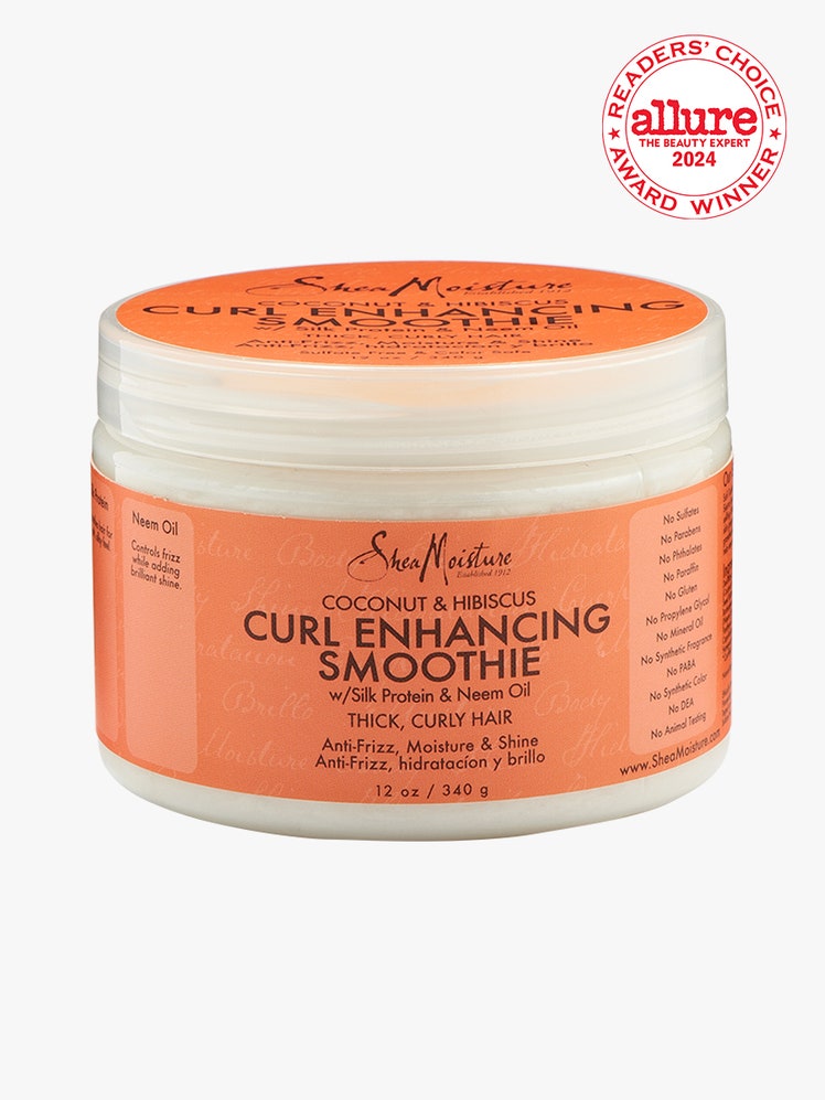 SheaMoisture Coconut & Hibiscus Curl Enhancing Smoothie white jar with orange label on light gray background with white and red Allure Readers' Choice Award seal in the top right corner