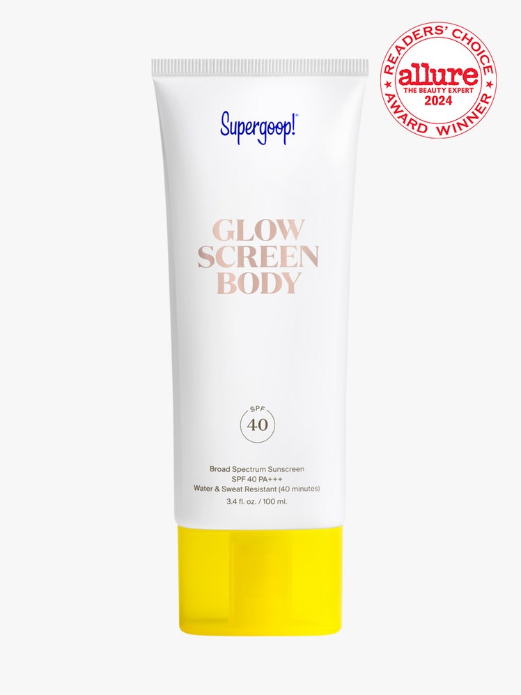 Supergoop Glowscreen Body SPF 40 white tube with yellow cap on light gray background with white and red Allure Readers' Choice Award seal in the top right corner