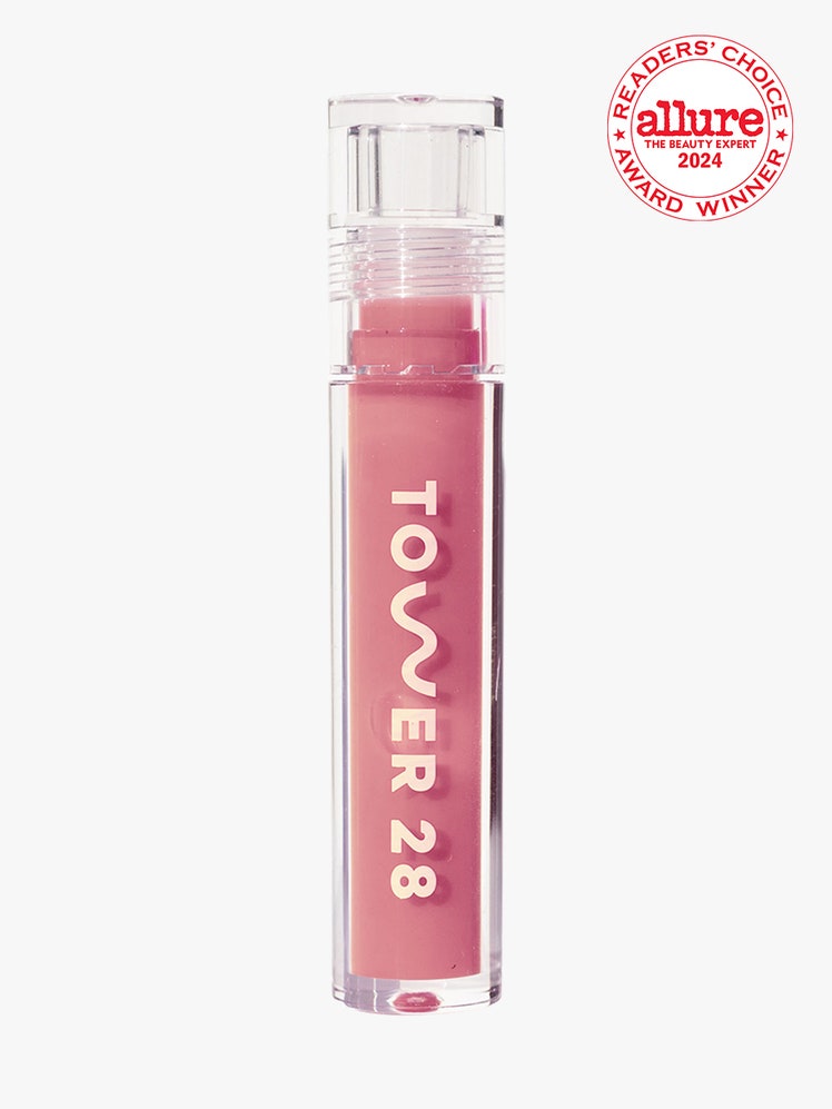 Tower 28 ShineOn Lip Jelly vial of pink lip gloss with clear cap on light gray background with white and red Allure...