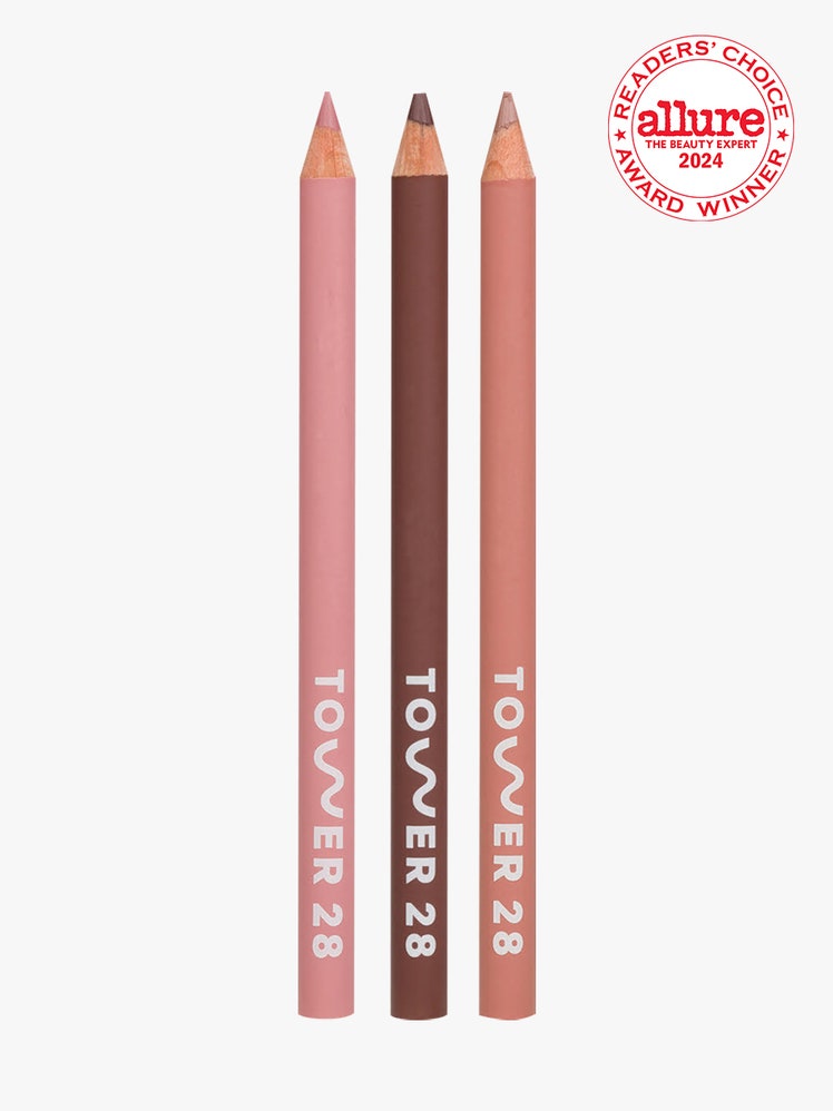 Tower 28 OneLiner Lip Liner three pink and brown eye and lip liners on light gray background with white and red Allure Readers' Choice Award seal in the top right corner