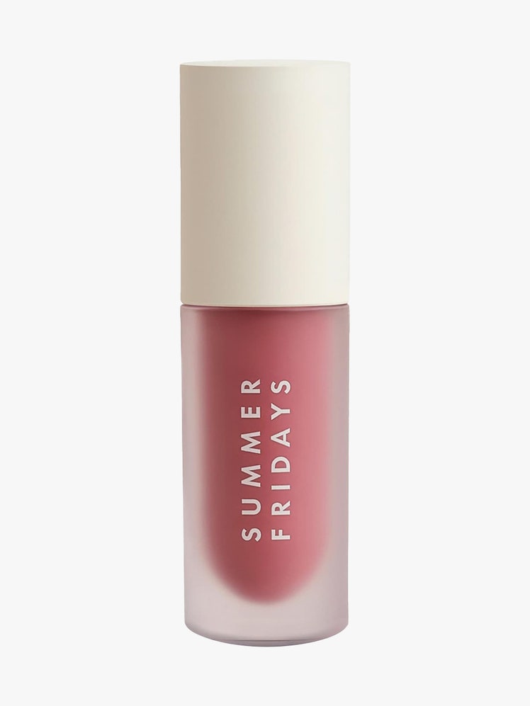 Dream Lip Oil in Soft Mauve vial of mauve lip oil with beige cap on light gray background