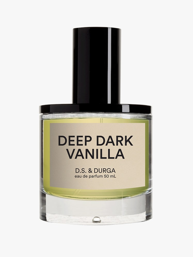 bottle of vanilla fragrance DSDurga Deep Dark Vanilla on a light gray background