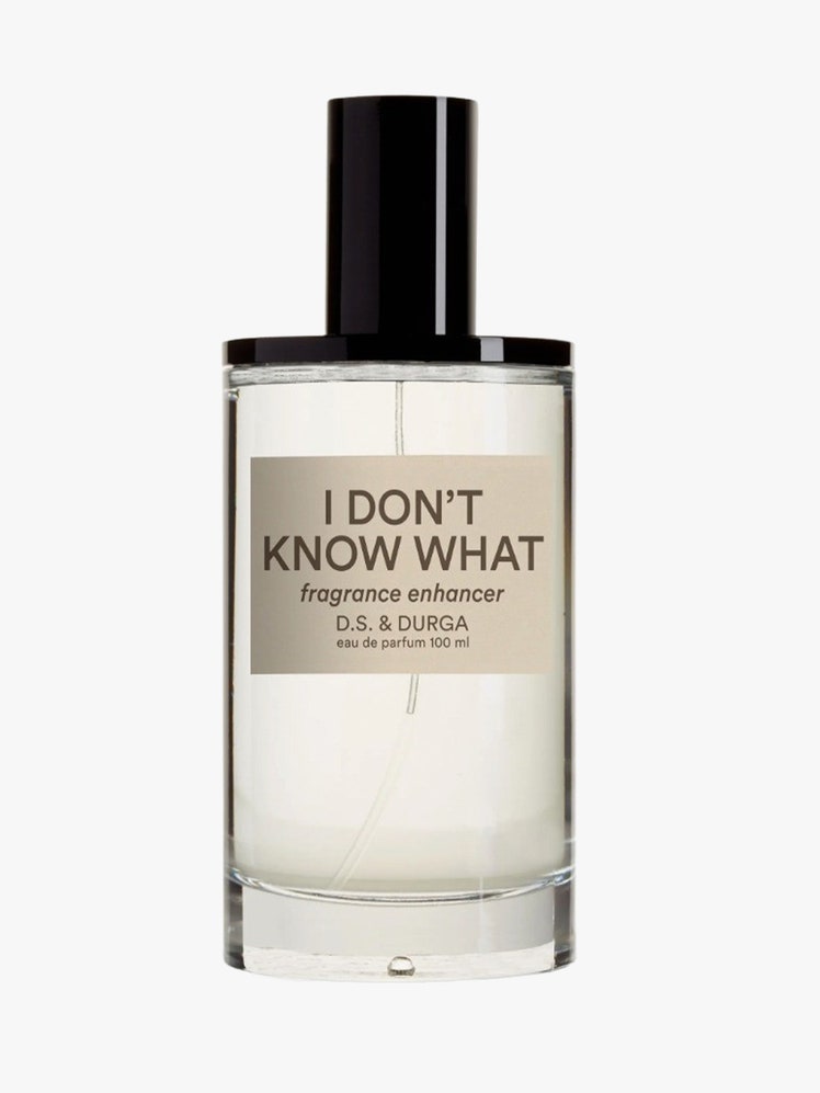 I Don't Know What Eau de Parfum clear jar with black top on light grey background