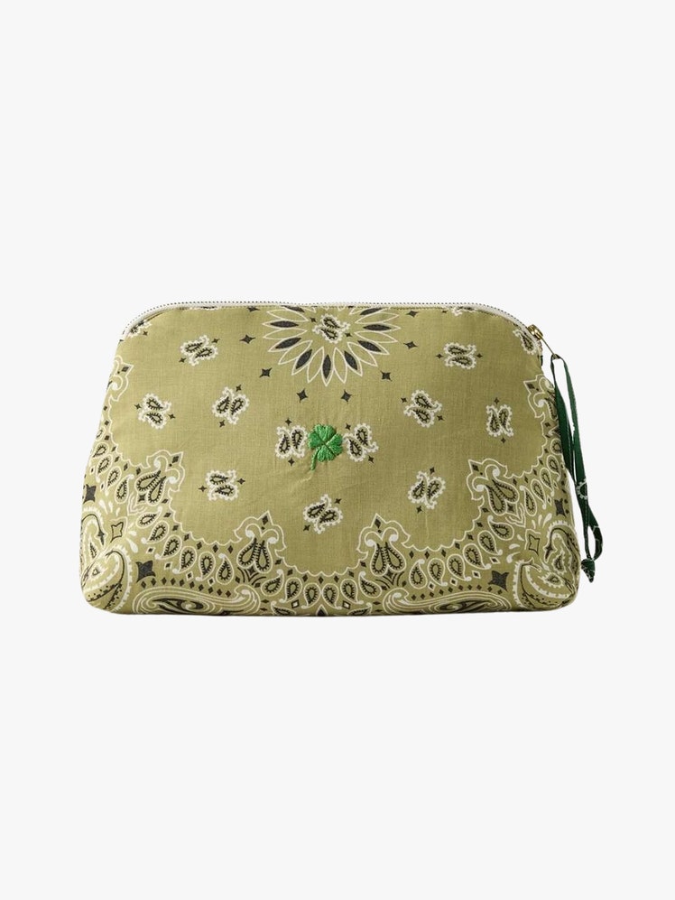 Cosmetic Pouch green pouch on light grey background