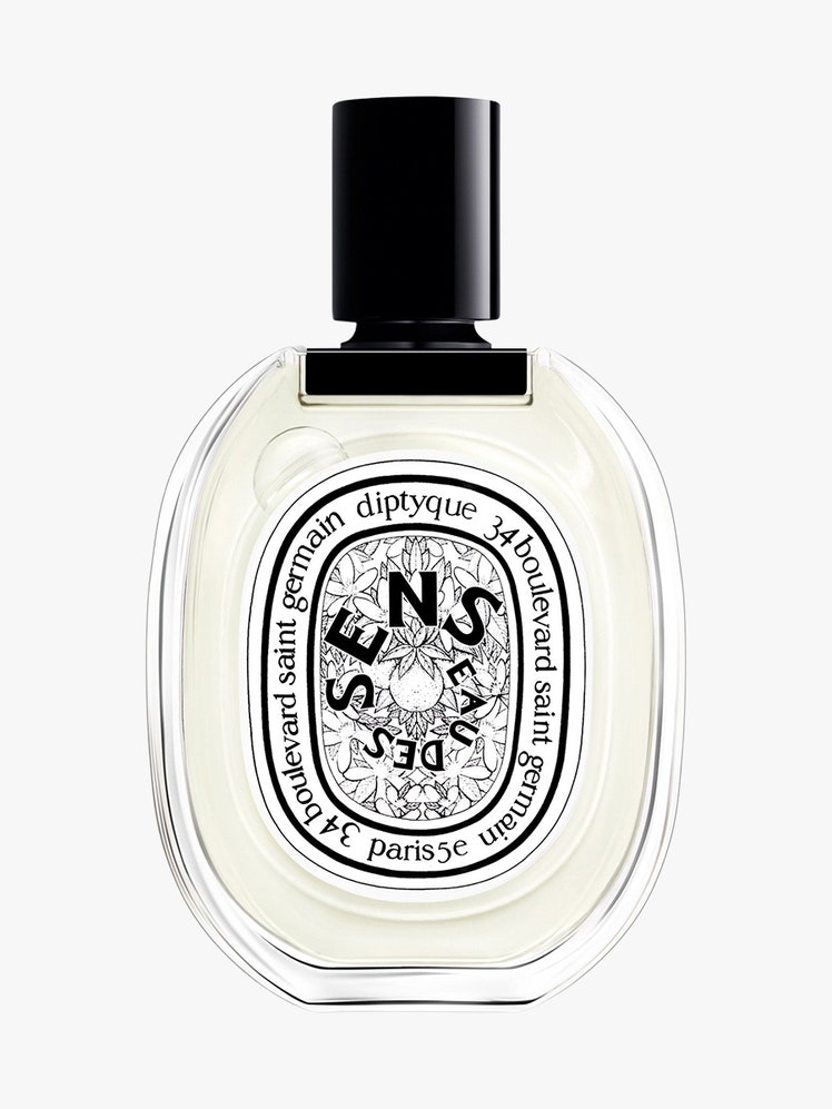 Eau Des Sens clear and black bottle on light grey background