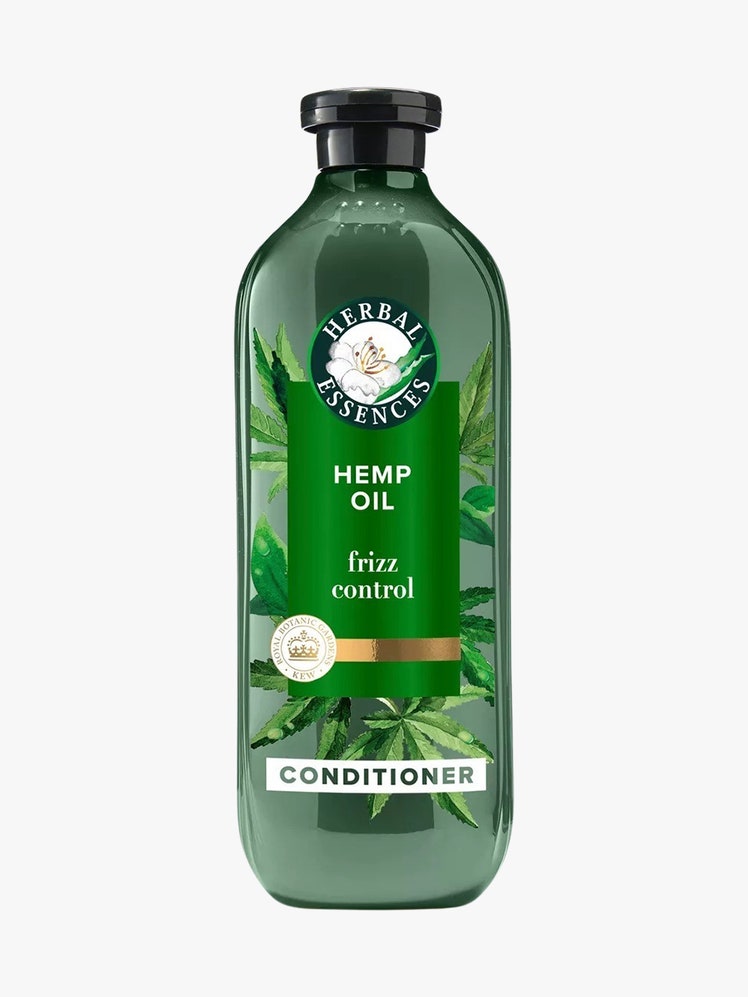 Hemp Oil Conditioner green bottle on light grey background