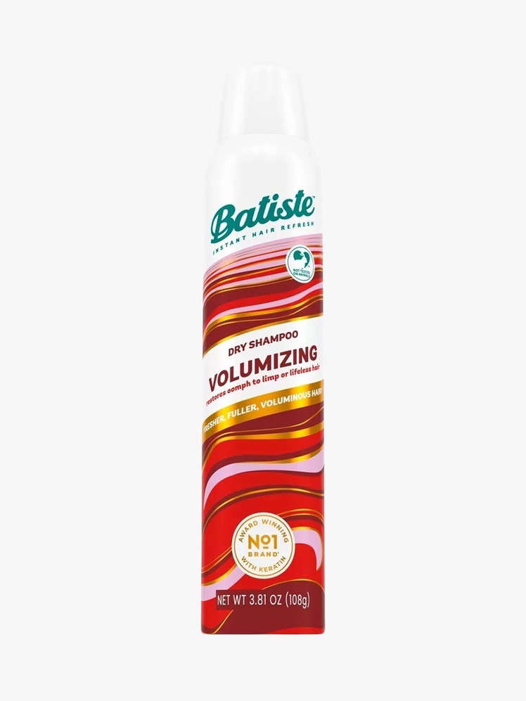 Volumizing Dry Shampoo red and white bottle on light grey background