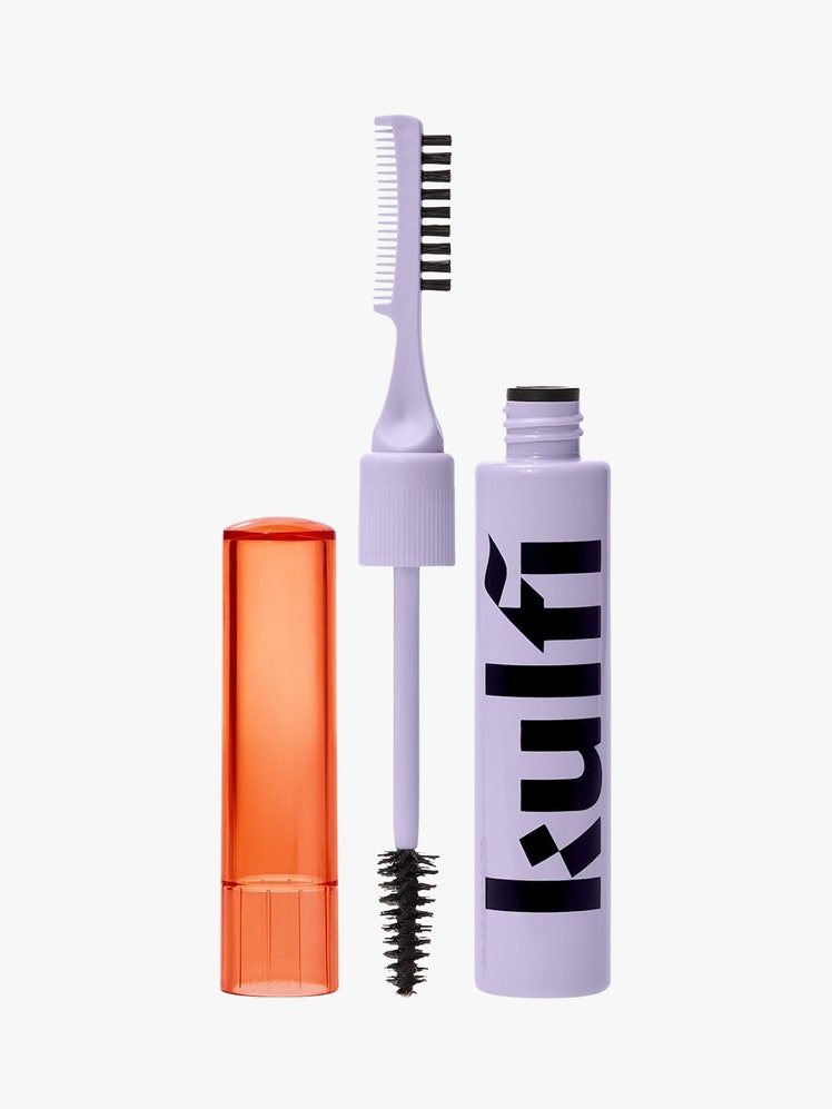 Free the Brow Volumizing  Laminating Brow Gel purple mascara set with orange cap on light grey background