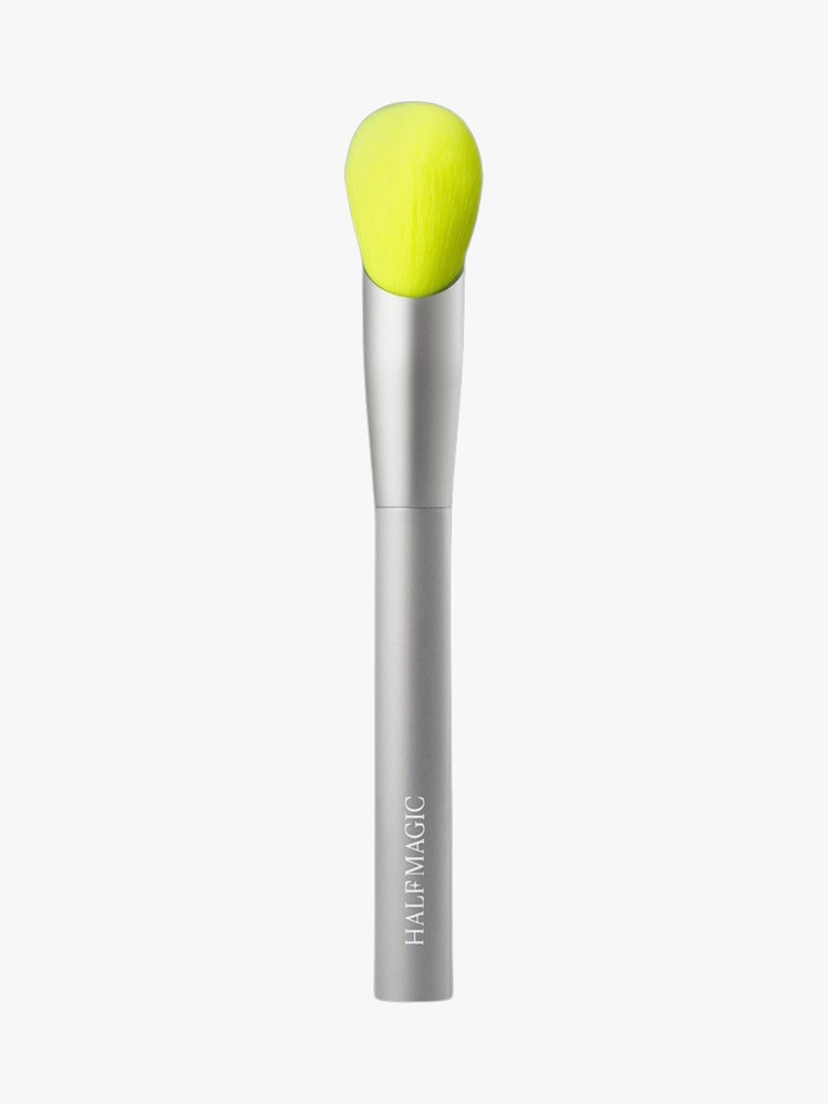 Baby Paw Blush Brush silver brush with green head on light grey background