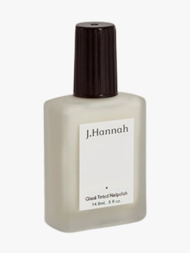 Nail Polish glass bottle on light grey background