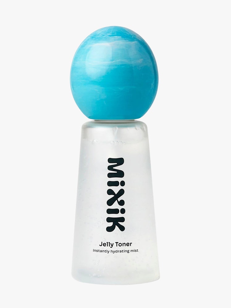 Jelly Toner opaque bottle with blue top on light grey background