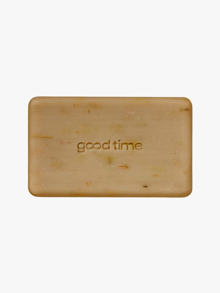 Cleansing Body Bar brown soap bar on light grey background