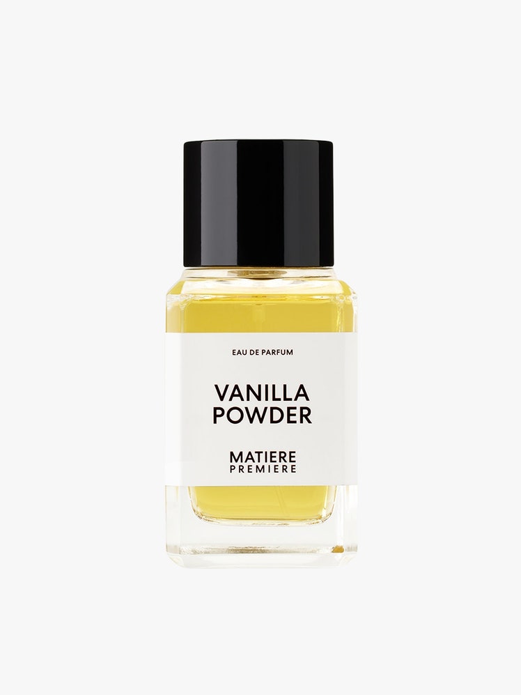 Vanilla Powder Eau de Parfum yellow jar with black top on light grey background