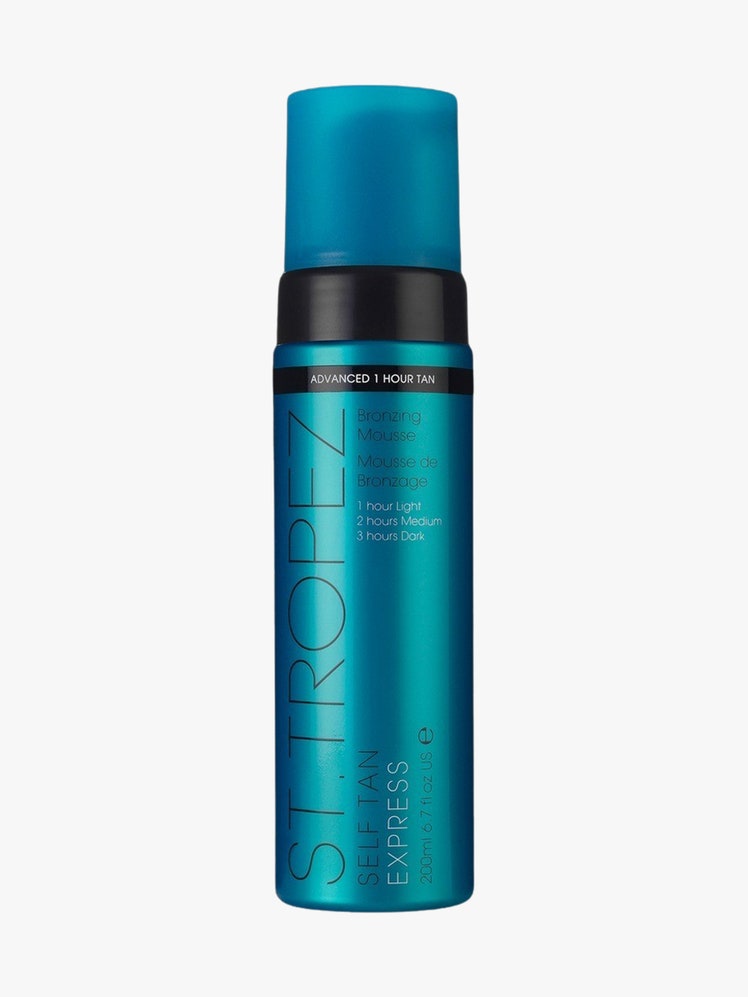 Self Tan Express Bronzing Mousse teal bottle on light grey background