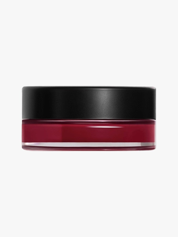 No.1 de Chanel Lip and Cheek Balm red jar with black lid on light grey background