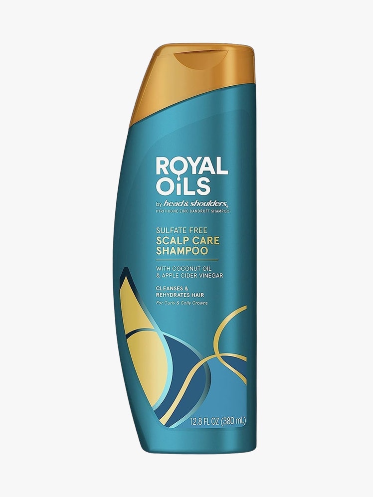 Royal Oils Shampoo teal and gold shampoo bottle on light grey background