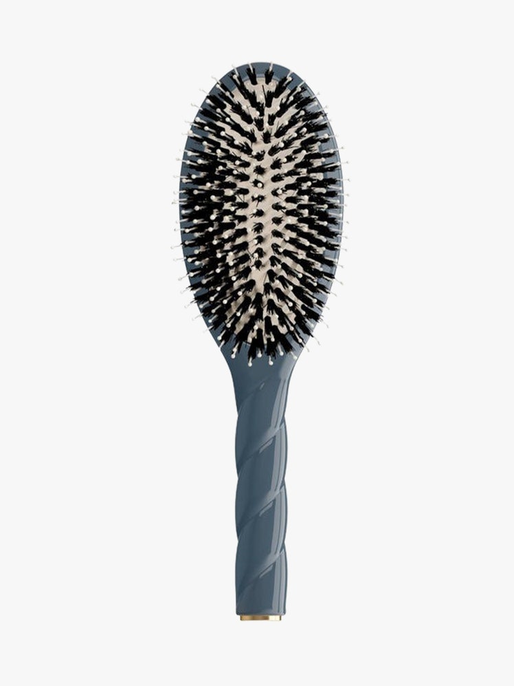 The Essential Soft Hair Brush blue brush on light grey background