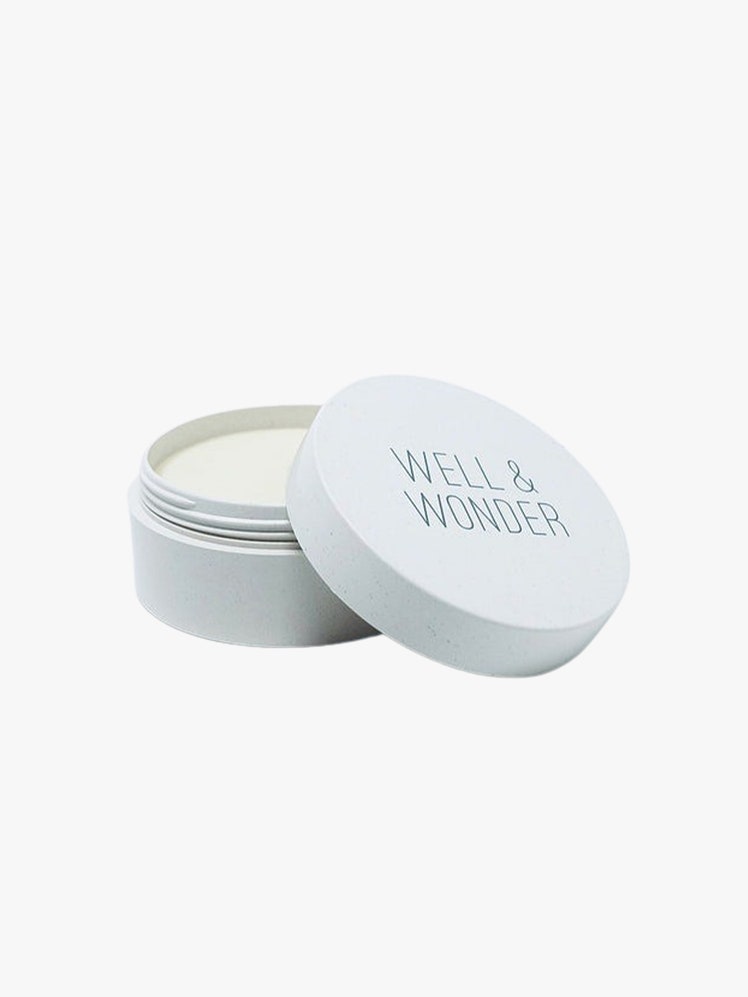 Body Balm white jar on light grey background