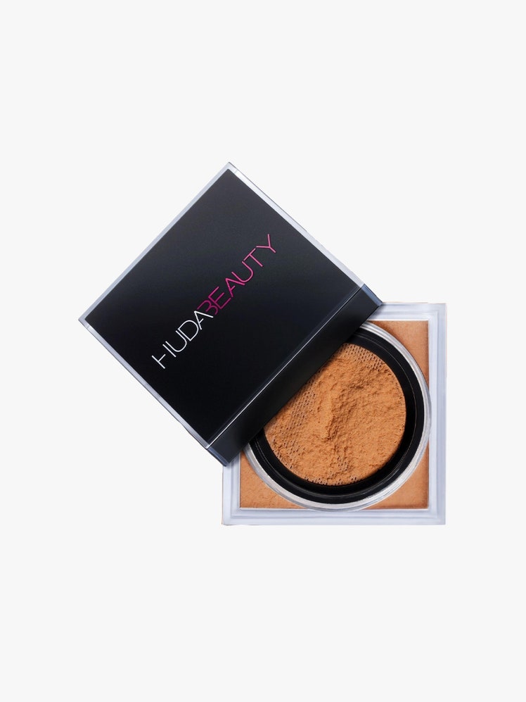 Easy Bake Loose Baking  Setting Powder tan makeup with black case on light grey background