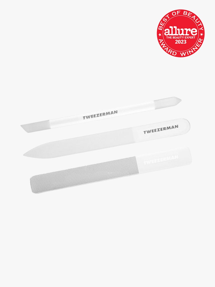 Tweezerman Glass Nailcare Set three tweezers on light grey background