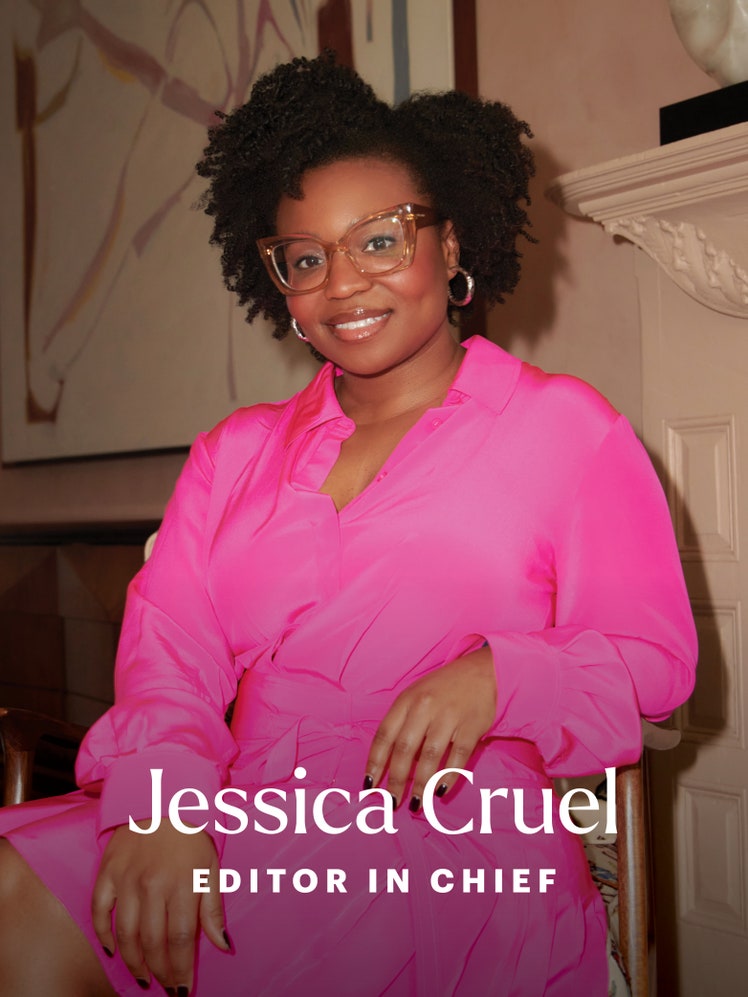 Jessica Cruel PortraitAllure's editor in chief wearing a hot pink dress wearing glasses sitting and posing