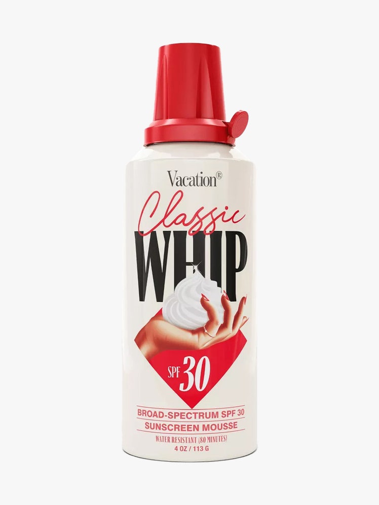 Vacation Classic Whip SPF 30 white and red whipped cream container of sunscreen on light gray background