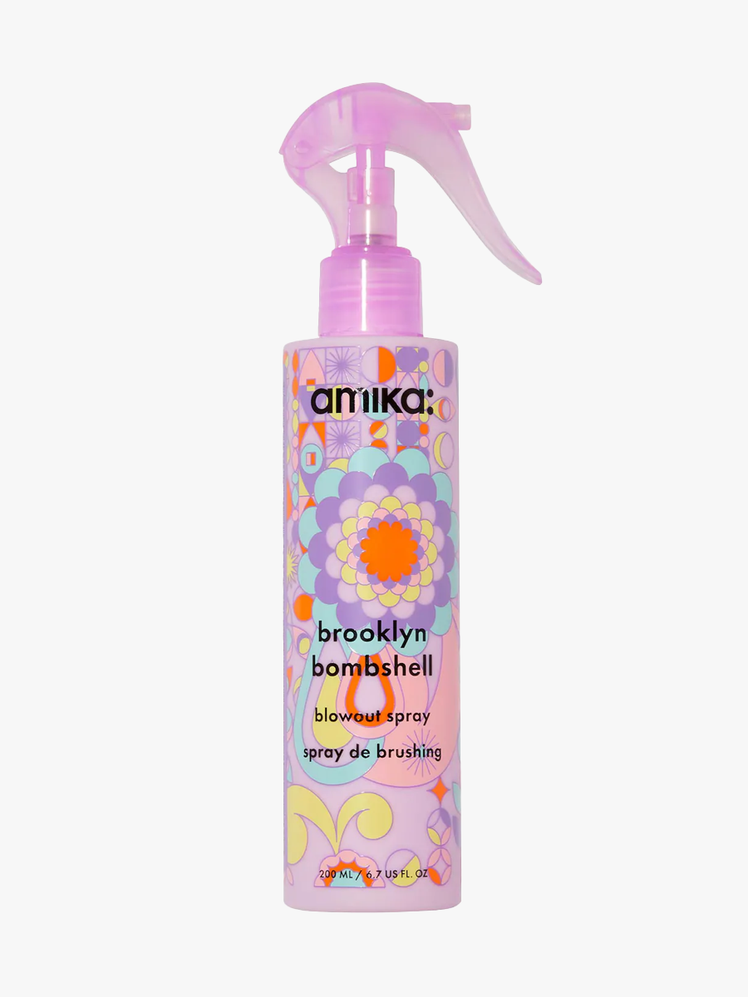 Amika Brooklyn Bombshell Blowout Volume Spray in patterned purple spray bottle