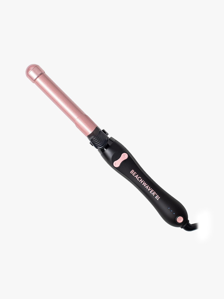 B1 Rotating Curling Iron in branded pink and black color way on light gray background