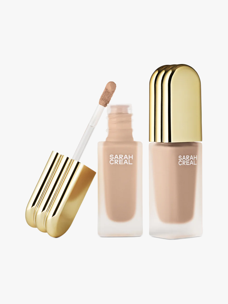 Face Flex Concealer  Complexion Enhancer in Light Neutral in branded frosted glass packaging with gold cap and doe foot...