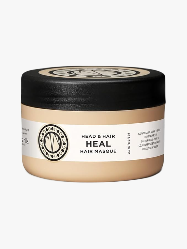 Head  Hair Heal Hair Mask in branded beige jar with black lid on light gray background