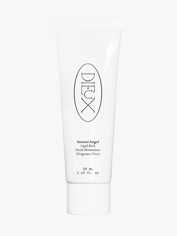 Instant Angel Moisturizer in branded white tube with cap on light gray background