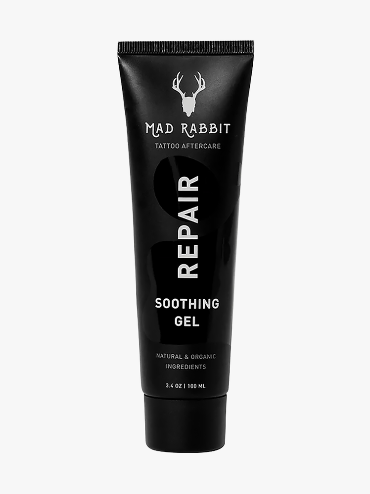 Repair Soothing Gel in branded black and white tube with cap on light gray background