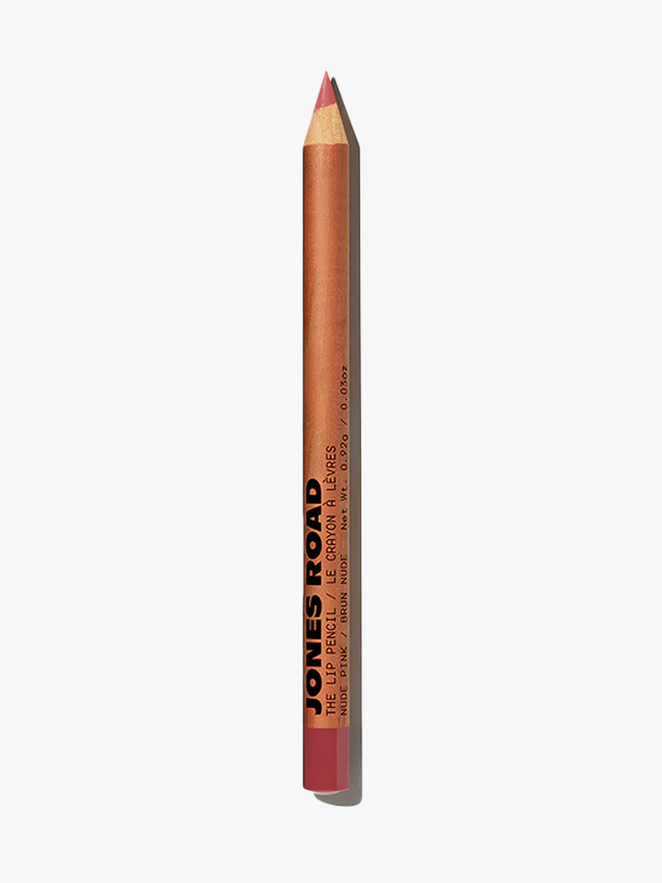 The Lip Pencil in Nude Pink in branded copper and pink pencil applicator on light gray background