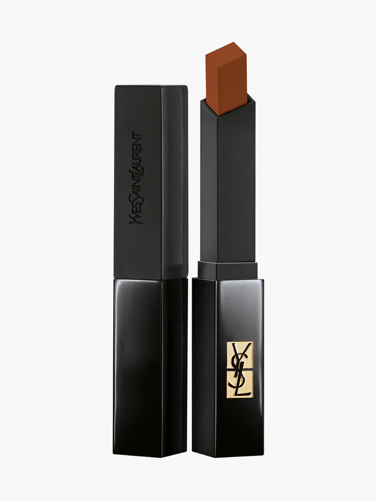 The Slim Velvet Radical Matte Lipstick in Shade 315 Boundless Maroon in branded gold and black tube on light gray background