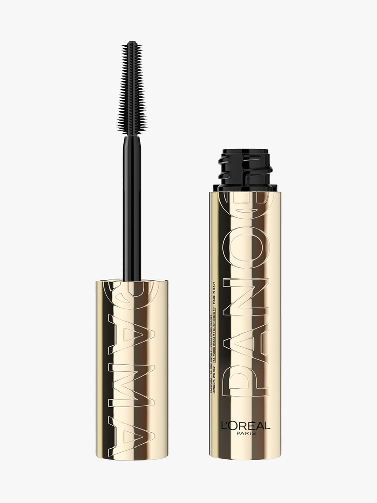 Voluminous Panorama Mascara in branded gold and black packaging with applicator brush on light gray background